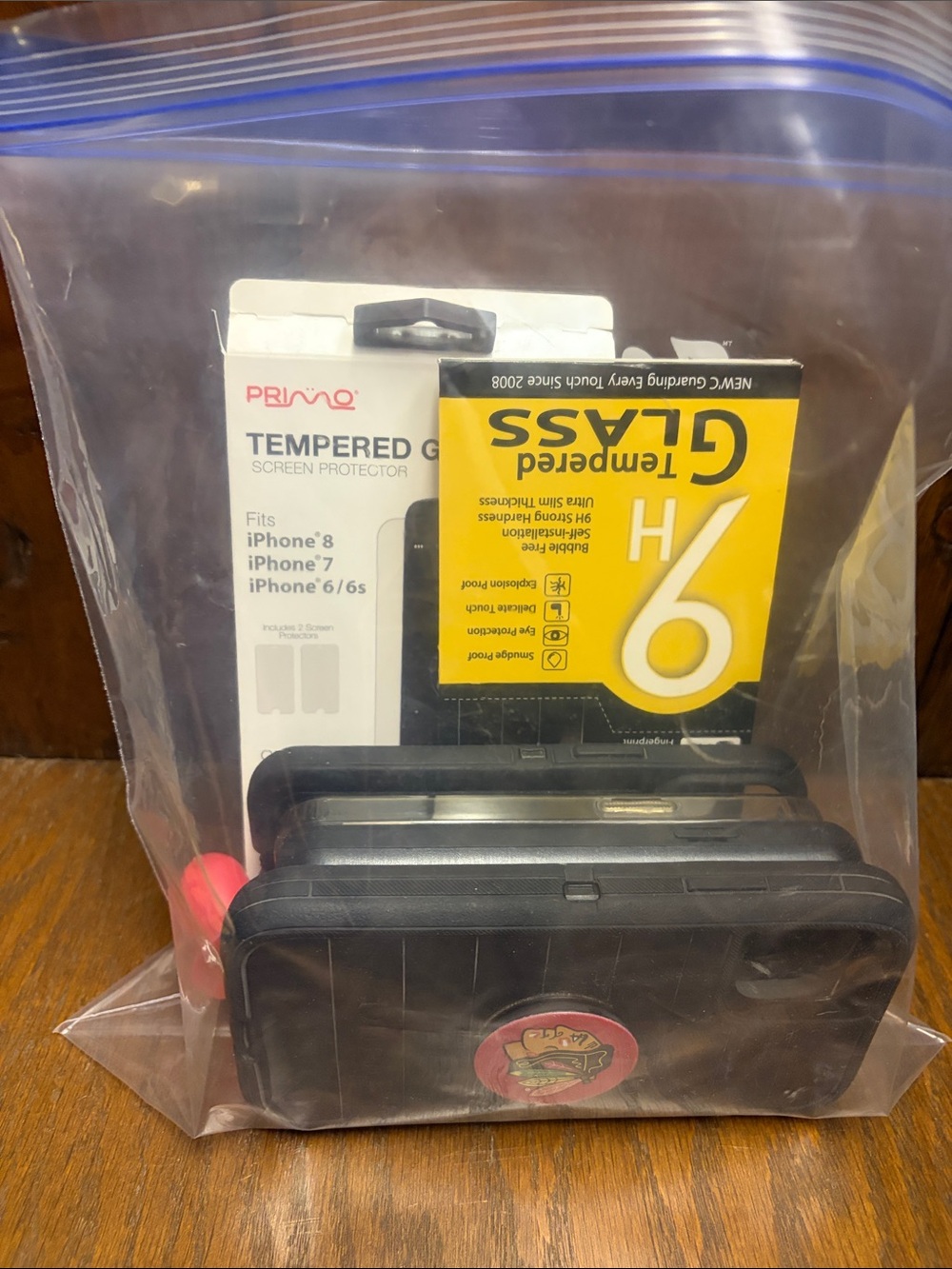Mystery lot of cell phone items.